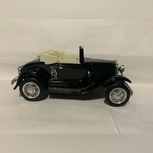 Black Vintage Model Car with Cream Interior